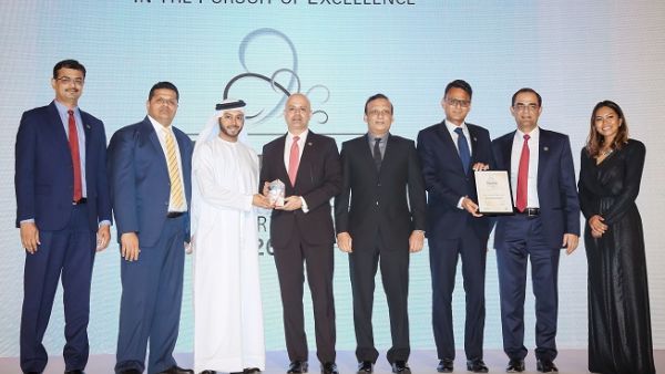 NBF team receiving Best Commercial Bank award.