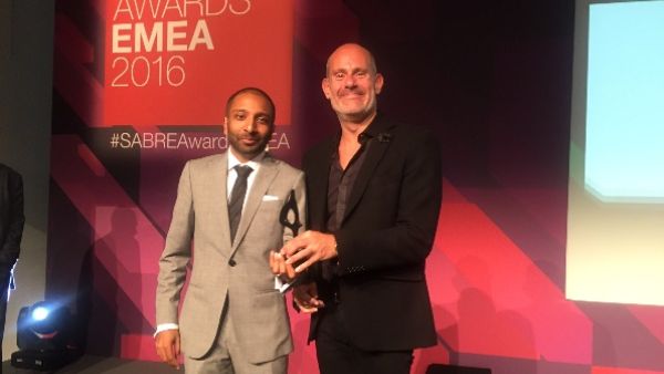 OPR EMEA CEO Michael Frohlich receiving the trophy