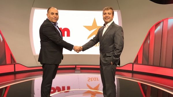 Sudhir Nagpal, Business Head, STAR Middle East, Africa and APAC with Emad Morcos, Chief Content Officer at OSN during the signing.