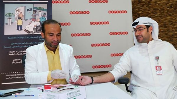 Ooredoo employee at the blood testing session Ooredoo employee at the blood testing session