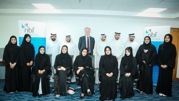 Picture of Vince Cook alongside the latest batch of the Management Training Programme participants