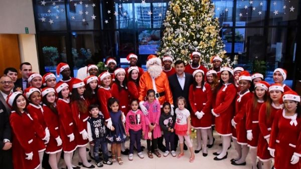 Good old jolly Santa Claus made a surprise appearance during the celebration and handed out gifts for the kids.