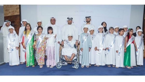 Sheikh Mansoor bin Mohammed bin Rashid Al Maktoum with the winners Sheikh Mansoor bin Mohammed bin Rashid Al Maktoum with the winners