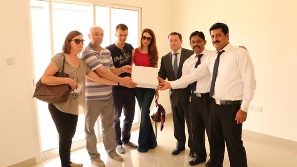 Startsev Family receiving Villa 41