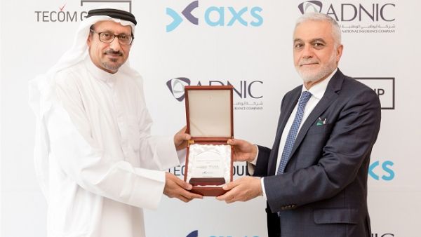 Ahmed Idris, CEO at Abu Dhabi National Insurance Company and Dr Ayoub Kazim, Managing Director, axs. Ahmed Idris, CEO at Abu Dhabi National Insurance Company and Dr Ayoub Kazim, Managing Director, axs.