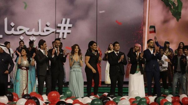 The jury of the TV show “Arab Idol” take part in a tribute for the Kuwaiti National Day last year. (AFP)