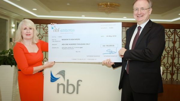 Vince Cook awarding 100,000 AED cheque to Mission to Seafarers. Vince Cook awarding 100,000 AED cheque to Mission to Seafarers.