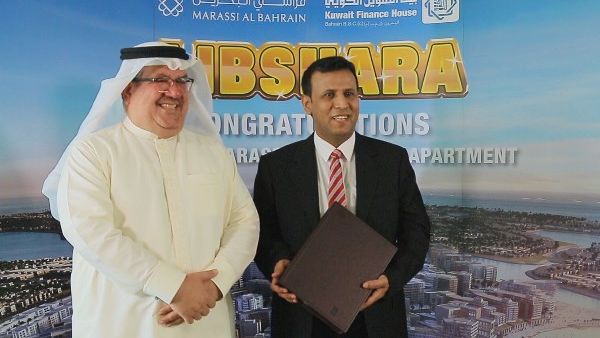 Mr. Khalid Rafea with the winner Mr. Adel Sarea Mr. Khalid Rafea with the winner Mr. Adel Sarea