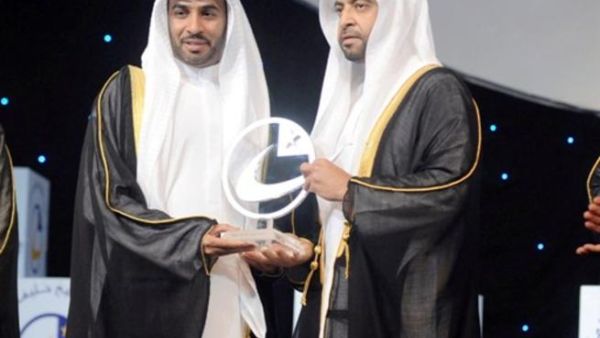 Ali Saeed Bin Harmal Al Dhaheri, Chairman of ADU Executive Board receiving the award