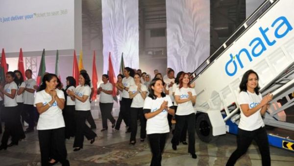dnata employees bearing flags representing the 38 countries in which dnata does business dnata employees bearing flags representing the 38 countries in which dnata does business
