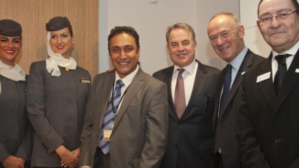 Etihad Airways cabin crew, Etihad Airways Manager Manchester Contact Centre Sanjay Parmar, Etihad Airways President and Chief Executive Officer James Hogan, Manchester City Council Leader Sir Richard Leese and Manchester City Council Chief Executive Sir Howard Bernstein at the opening of the Etihad Airways Guest Contact Etihad Airways cabin crew, Etihad Airways Manager Manchester Contact Centre Sanjay Parmar, Etihad Airways President and Chief Executive Officer James Hogan, Manchester City Council Leader Sir Richard Leese and Manchester City Council Chief Executive Sir Howard Bernstein at the opening of the Etihad Airways Guest Contact