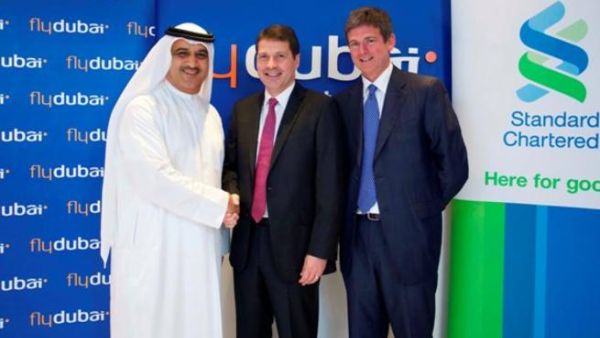 flydubai’sCEO, Ghaith Al Ghaith, Jonathan Morris, CEO, Standard Chartered UAE and Kieran Corr, Chief Commercial Officer Pembroke Group at the contract signing