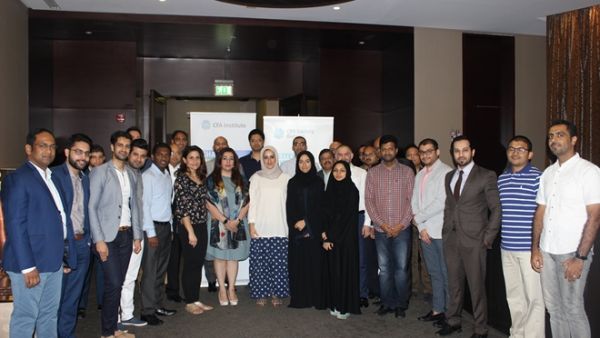 Mahesh Balasubramanian, Audit Partner at KPMG FAKHRO in Bahrain, with the workshop participants at the CFA Society Bahrain.