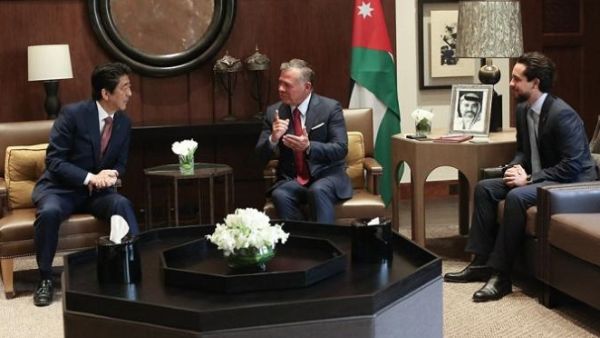His Majesty King Abdullah holds a meeting with Japanese Prime Minister Shinzo Abe, attended by HRH Crown Prince Hussein, in Amman on Tuesday (Courtesy of Royal Court)