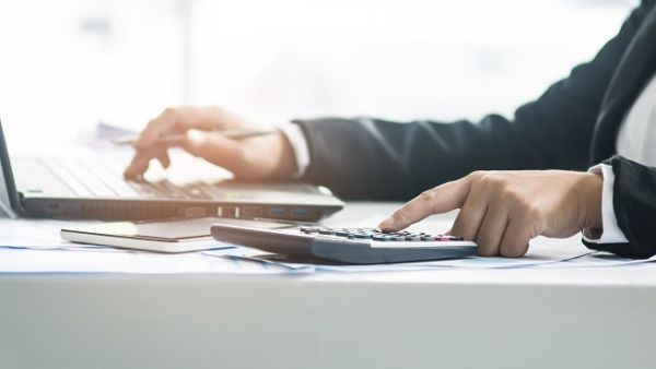 Almost half of respondents in a survey claim they have less debt now than they did last year. (Shutterstock)