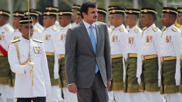 Qatar's Emir Sheikh Tamim bin Hamad Al Thani inspects an honor guard during a welcome ceremony in Kuala Lumpur, Malaysia, on October 16, 2017. (Vincent Thian/ AP) Qatar's Emir Sheikh Tamim bin Hamad Al Thani inspects an honor guard during a welcome ceremony in Kuala Lumpur, Malaysia, on October 16, 2017. (Vincent Thian/ AP)
