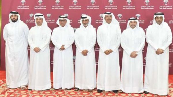Qatar Football Association president HE Sheikh Hamad bin Khalifa bin Ahmed al-Thani (centre) poses with other officials after being re-elected for another four-year term at the General Assembly of the body yesterday. (Photo: Gulf Times)