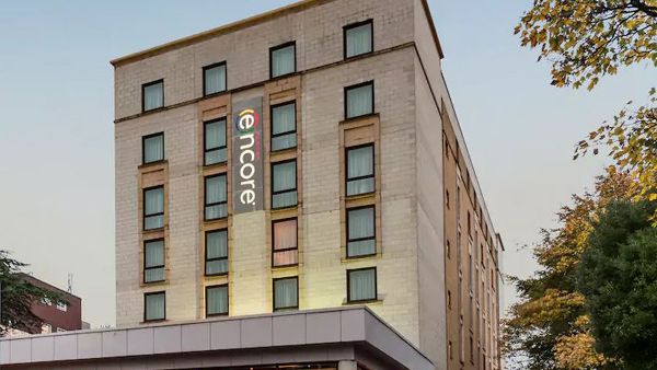 Ramada Encore, a three-star hotel offering 140 deluxe rooms and 24 suites.