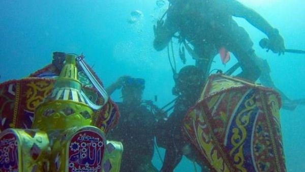 Yaheya Ashfaq, Umer Jan and Qazi Ajma, three Pakistani divers living in Saudi Arabia, filmed themselves praying underwater to welcome the month of Ramadan. (Facebook)