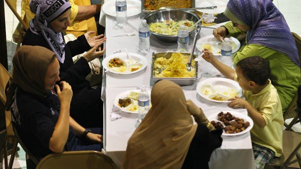 Iftar, the breaking of the fast during Ramadan, is made easier for outdoor workers by community fridges set up throughout Dubai. (AFP/File)