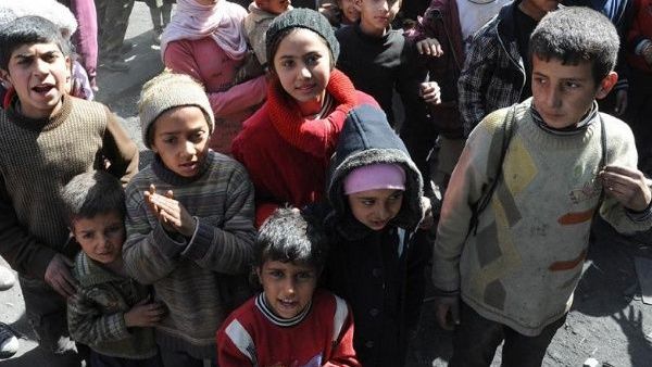 Children from Syria's besieged Yarmouk refugee camp for Palestinian refugees (AFP/File Photo)	