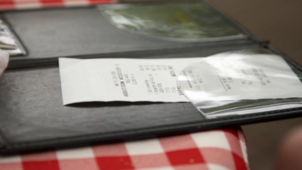 Who knew that covering a check could lead to death? (Shutterstock)