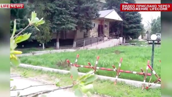 News footage shows the police station in Russia's Stavropol region after the suicide attack took place. (Screenshot/Life News)