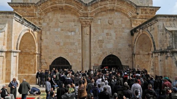 Palestinians worshippers gather before Friday noon prayers last week at the so-called 'Golden Gate' in Jerusalem's Old City. (AFP/ File Photo)