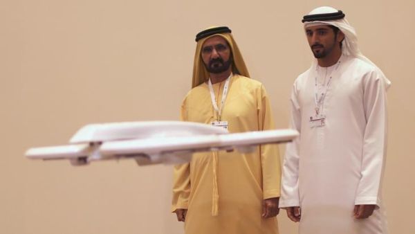 Sheikh Hamdan bin Mohammed bin Rashid al Maktoum together with his father Sheikh Mohammed bin Rashid al Maktoum (left) visiting the "Virtual Future" exhibition in Dubai on 9 February 2014. (AFP/File) Sheikh Hamdan bin Mohammed bin Rashid al Maktoum together with his father Sheikh Mohammed bin Rashid al Maktoum (left) visiting the "Virtual Future" exhibition in Dubai on 9 February 2014. (AFP/File)