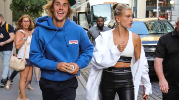 Justin Bieber and Hailey Baldwin are "enjoying the ride" that comes with their engagement (Source: Liam Goodner / Shutterstock )