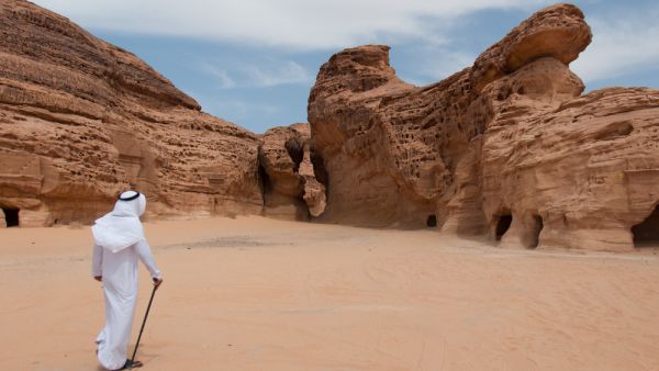 Saudian walking in Madain Saleh archeological site, Saudi Arabia. (Shutterstock/ File Photo)