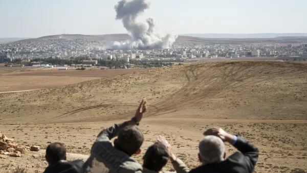 Smoke rises in Syria, after an airstrike (Shutterstock)	