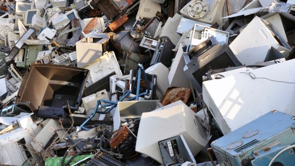 Once a breaking session is over, cleaners sweep away the wreckage, filling it into blue cloth bags to be transported to recycling centers for a chance at a brand new life instead of ending up in a landfill (Shutterstock/File)