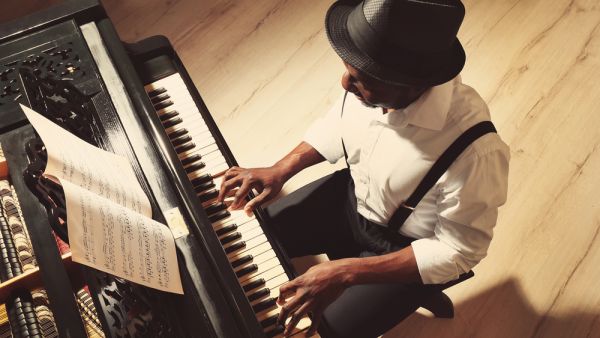 Man on Piano. (Shutterstock/ File Photo)