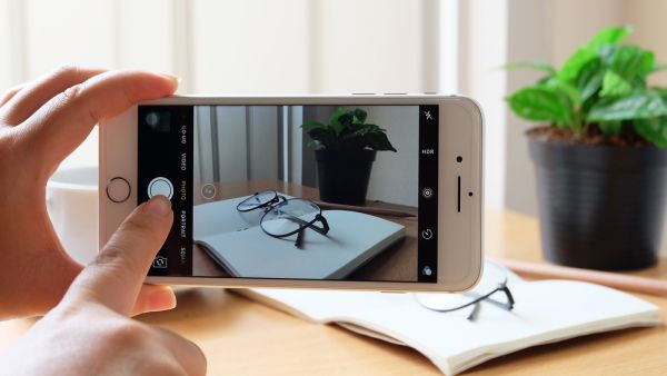 An Apple iPhone 7 plus taking a photo. (Shutterstock)