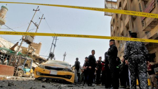 Iraqi police beside suicide attack site in baghdad. (AFP/ File)