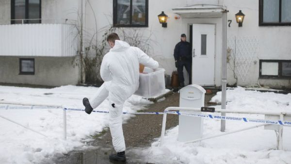 Police investigators are seen outside a home for juvenile asylum seekers in Molndal in southwestern Sweden on Jan. 25, 2016. A 22 year old female employee was killed in a knife attack at the center for migrant youths. (AFP/Adam Ihse)