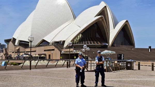 Security officers stand outside the Sydney Opera House. (AFP/File)