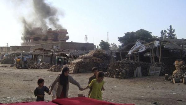 This file photo shows smoke billowing from the location of a Taliban attack in Afghanistan's Kunduz. (AFP/File)