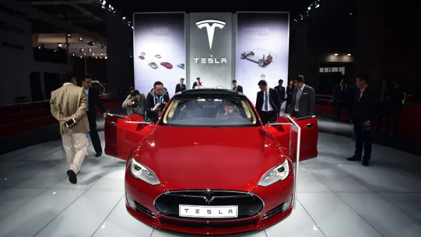 A Tesla Model S car is displayed at the 16th Shanghai International Automobile Industry Exhibition on April 20, 2015. (Johannes Eisele/ AFP)