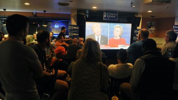 ملايين الأمريكيين تابعوا المناظرة الأولى بين ترمب وكلينتون - ا ف ب