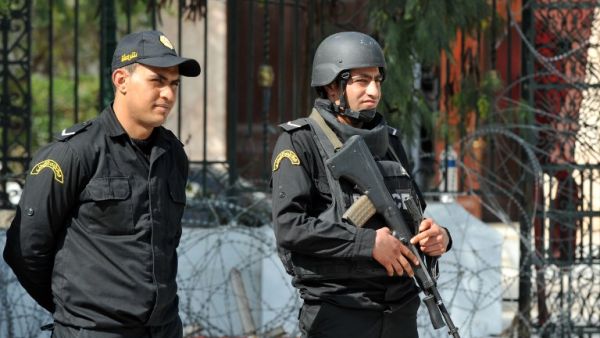 Tunisian security forces stand guard outside the National Bardo Museum in Tunis on March 19, 2015. (AFP/File)
