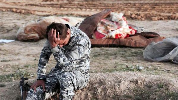 Kurdish forces discovered a mass grave near the Iraqi village of Sinuni, in the northwestern Sinjar area (Twitter)