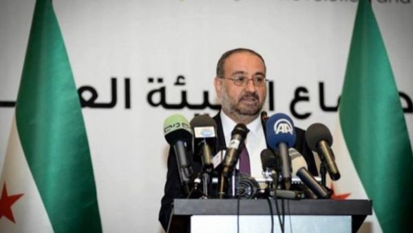 Ahmad Tuma, the leader of the SNC "does not represent us," according to the Free Syrian Army and 12 other opposition groups Wednesday (AFP)
