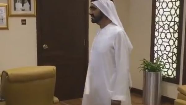 When Sheikh Mohammad paid a surprise visit to senior government officials, he was confronted by a row of empty desks. (Twitter/Dubai Media Office)