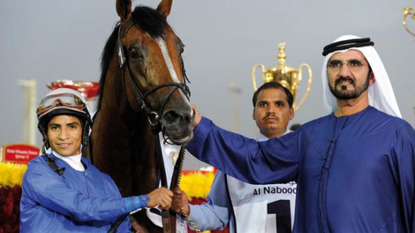 Sheikh Mohammed at the horse races (Image source: alshindagah.com)