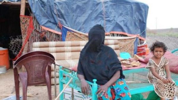 Umm Ali lives in a straw hut without electricity with her seven children 