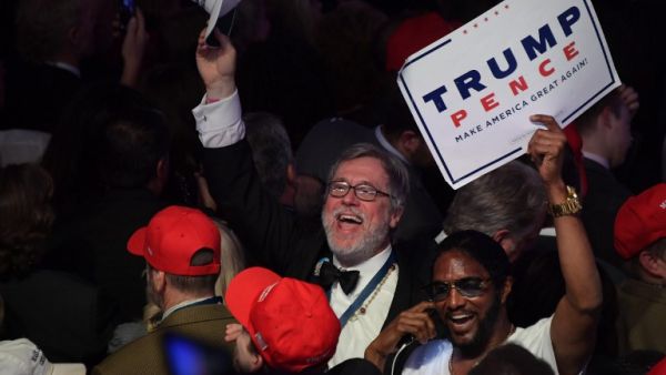 Republican supporters celebrate Trump's victory in the presidential election (Jim Watson/AFP)