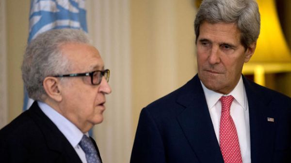  U.N-Arab League envoy for Syria Lakhdar Brahimi (L) speaks as U.S. Secretary of State John Kerry looks on after their meeting at Winfield House (Image credit: AFP)