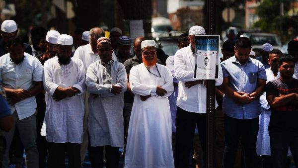 The Muslim community in New York gathers for prayer after an imam and his assistant were shot leaving a mosque in Queens. (AFP/File)